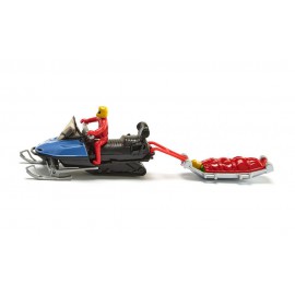 Snow mobile with rescue sledge